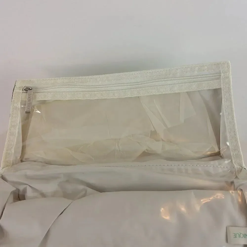 Clinique cream floral print fold over makeup / jewelry bag.